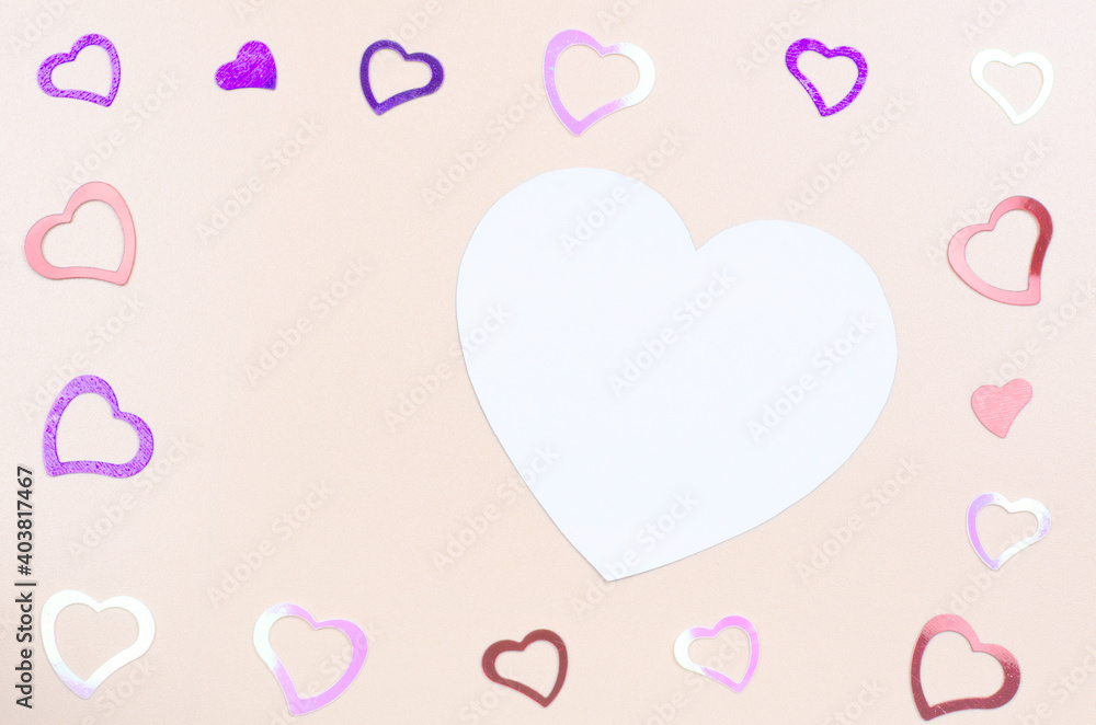 Festive romantic background of hearts of different colors with place for text. Valentines day greeting card Festive romantic background of hearts of different colors with place for text. Valentines day greeting card