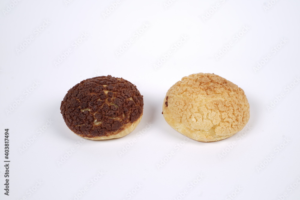 French traditional Choux pastry ball. Choux with filling chantilly cream. Fresh golden profiterole or Pate a choux. Selective focus. Cream Puffs, choco vanilla Choux isolated on white background.
French traditional Choux pastry ball. Choux with filling chantilly cream. Fresh golden profiterole or Pate a choux. Selective focus. Cream Puffs, choco vanilla Choux isolated on white background.