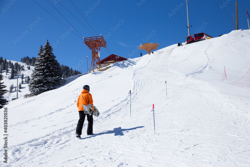 Snowboarder On The Skiing Slope