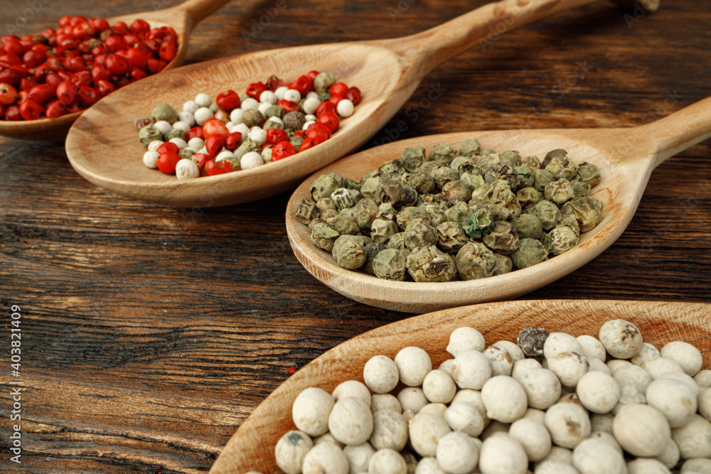 Red, green and white peppercorns spice macro Red, green and white peppercorns spice macro