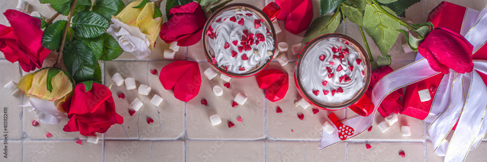 Valentine hot chocolate or coffee, Two red cups with hot chocolate or latte drink, with whipped cream ans sugar heart sprinkles, with roses bouquet ad gift box - obrazy, fototapety, plakaty 
