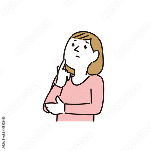 考え事をして不安な表情の30代の女性