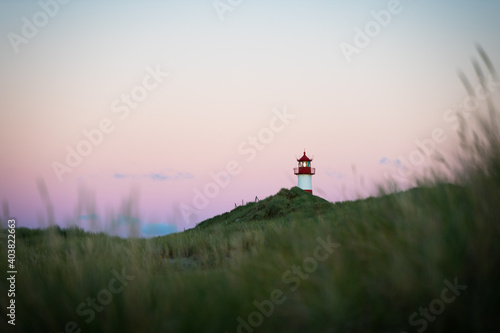 Lighthouse on Sylt island Germany during colorful cloudless sunset no. 2