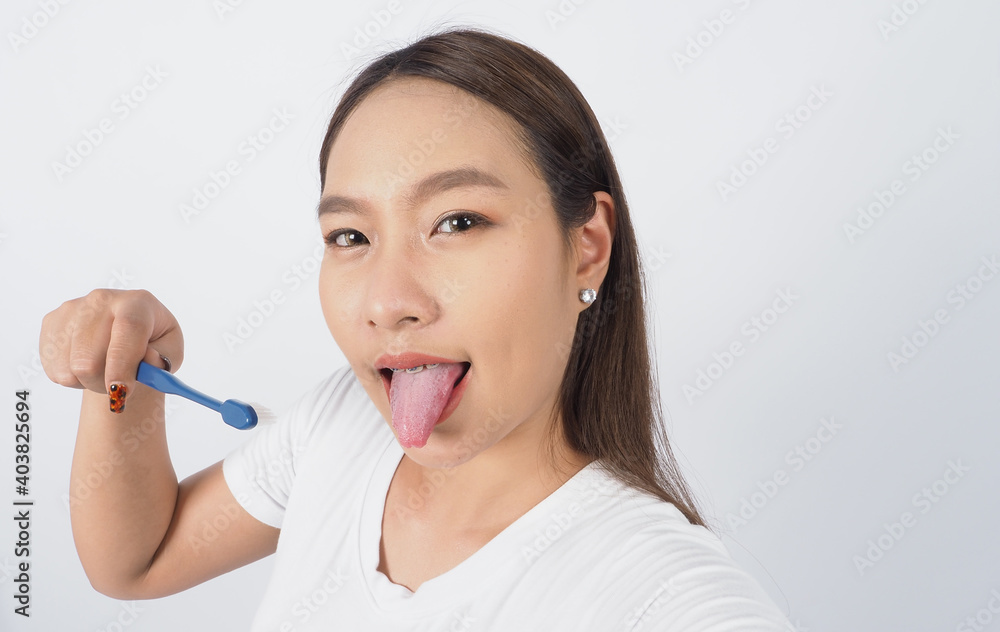 Braces teeth. Dental brace sexy girl smile holding toothbrush and looking to camera. white teeth with blue braces. Dental care. Asian woman with contact lens and orthodontic. Dental care concept. Braces teeth. Dental brace sexy girl smile holding toothbrush and looking to camera. white teeth with blue braces. Dental care. Asian woman with contact lens and orthodontic. Dental care concept.