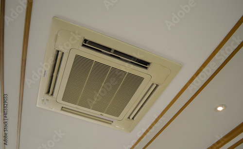 Old commercial built-in air conditioner  in classic meeting room.