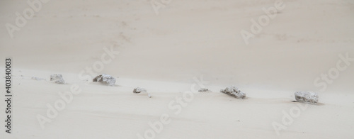 Panoramic shot of small rocks on the sea at daylight in Sardinia Bay, South Africa