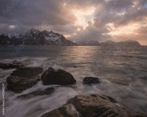 Wallpaper Mural Rugged mountains of Flakstad√∏y rise across sea from rocky coastline at Vareid, Lofoten Islands, Norway Torontodigital.ca