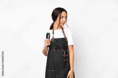 Young hairdresser woman isolated on white background portrait