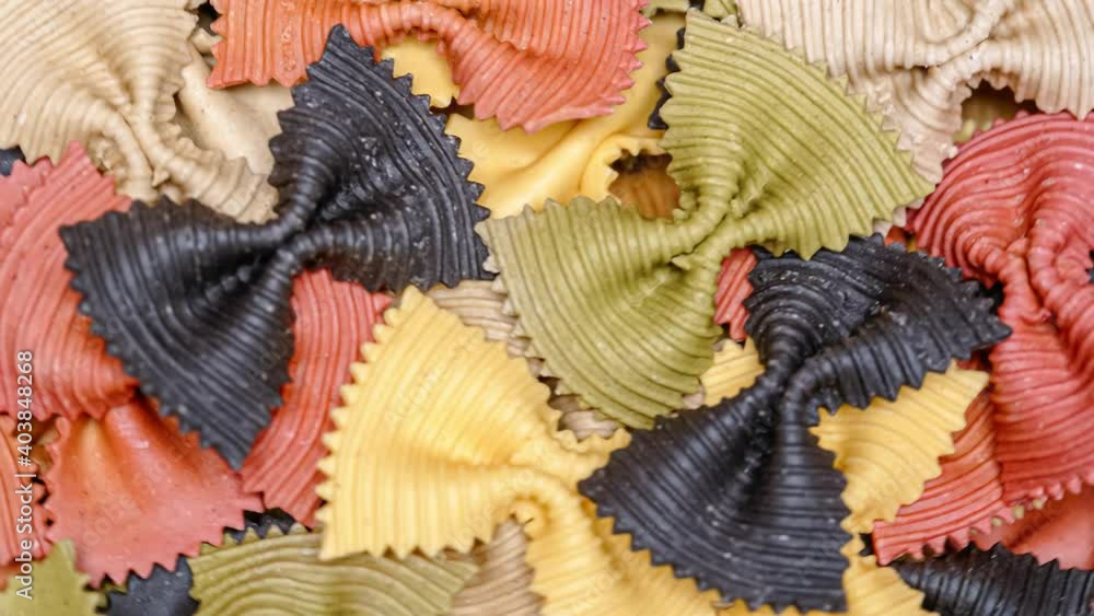 Colored Farfalle Pasta bow tie pasta background. Colored Farfalle Pasta bow tie pasta background.