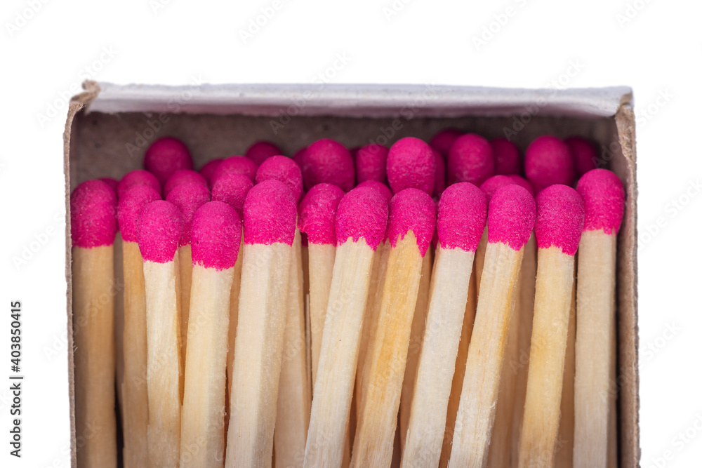 Wooden brown matches in a box close up. Wooden brown matches in a box close up.