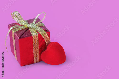 gift box and hearts on pink background, valentine's day