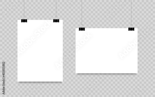 Blank poster hanging on clips. A4 paper page In landscape and portrait formats. Realistic white paper sheet. Mockup poster for design.