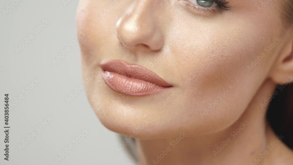 close-up of gorgeous woman with light mua posing close-up of gorgeous woman with light mua posing