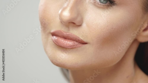 close-up of gorgeous woman with light mua posing photo