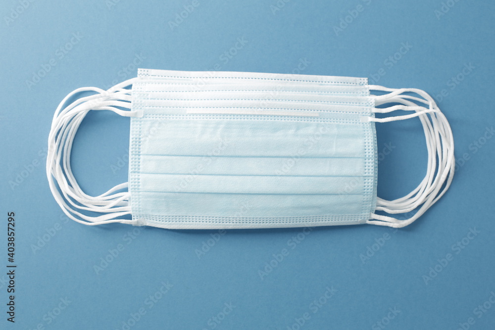 Respiratory masks on the background. Protective medical mask. Coronavirus protection concept. Respiratory masks on the background. Protective medical mask. Coronavirus protection concept.