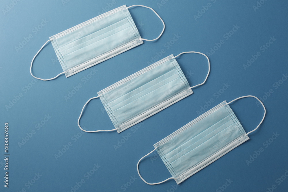 Respiratory masks on the background. Protective medical mask. Coronavirus protection concept. Respiratory masks on the background. Protective medical mask. Coronavirus protection concept.