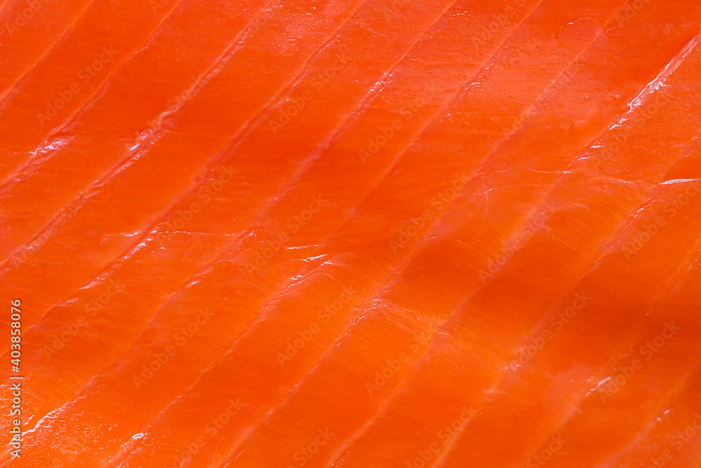 Salmon fillet background. A background of fresh smoked salmon Salmon fillet background. A background of fresh smoked salmon