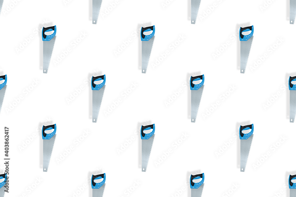 Hand saw seamless pattern on a white background. Hand saw seamless pattern on a white background.