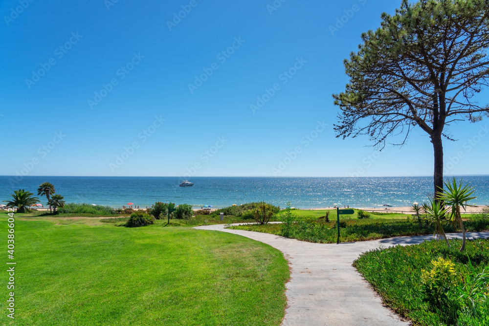 Resort luxury beaches, golf courses with palm trees, overlooking the sea for tourists to relax. Portugal algarve Resort luxury beaches, golf courses with palm trees, overlooking the sea for tourists to relax. Portugal algarve