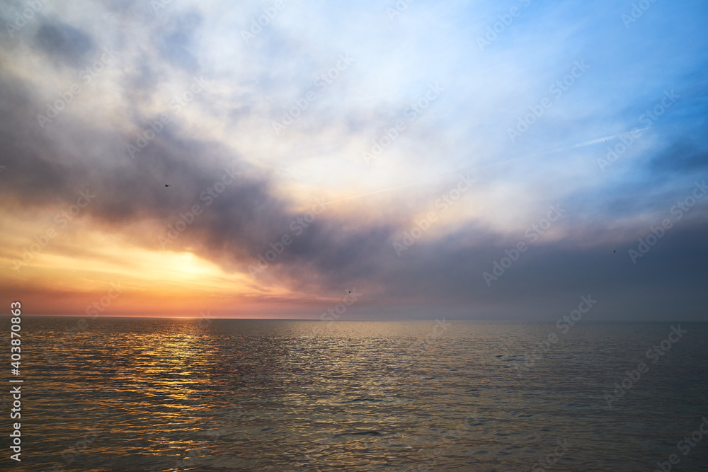 Sea sunset. Smoke wildfires sweeping across the sky. Sea sunset. Smoke wildfires sweeping across the sky.