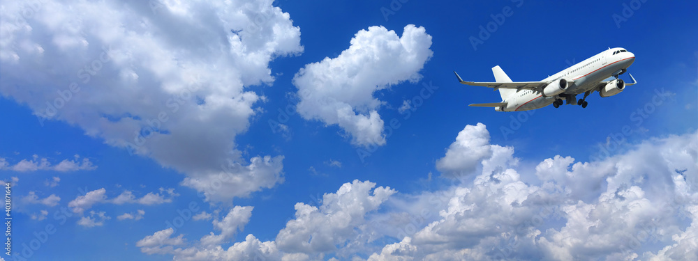 Zoom photo of passenger airplane taking off in deep blue sky and beautiful clouds Zoom photo of passenger airplane taking off in deep blue sky and beautiful clouds