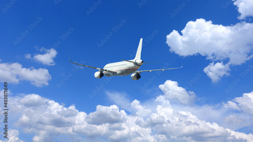 Zoom photo of passenger airplane flying in deep blue sky and beautiful clouds Zoom photo of passenger airplane flying in deep blue sky and beautiful clouds