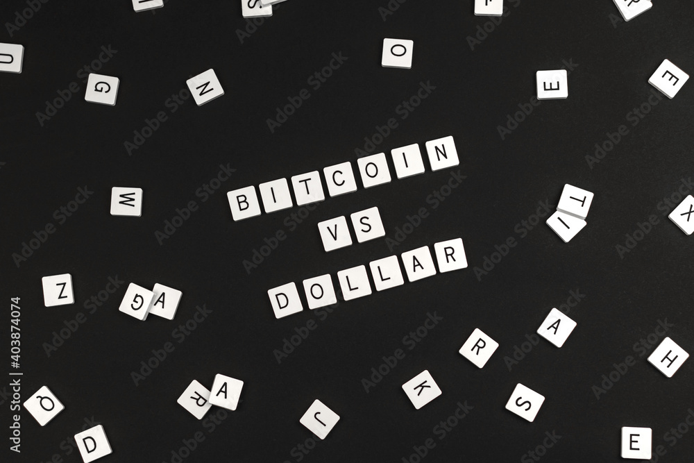Bitcoin and dollar word concept, template on black background, comparison of two currency Bitcoin and dollar word concept, template on black background, comparison of two currency