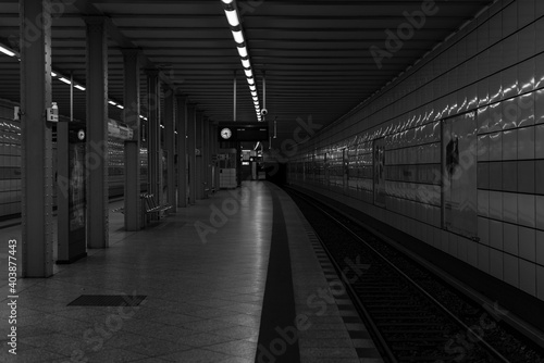 Underground Station in Berlin, Empty platform of a subway station in Berlin, black and white photo photo