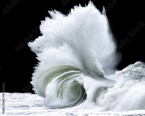 A large wave crashes on the Washington coast.