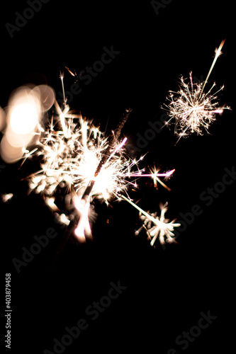 Vertical closeup of a sparker with a dark background photo