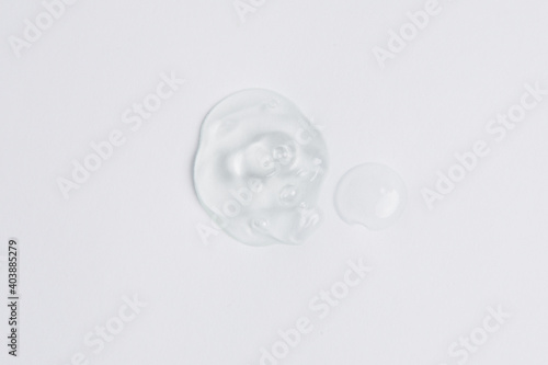 drop of transparent gel on white background, copy space