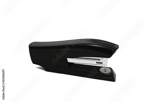 black stapler stationery isolated on a white background, a tool for working with paper