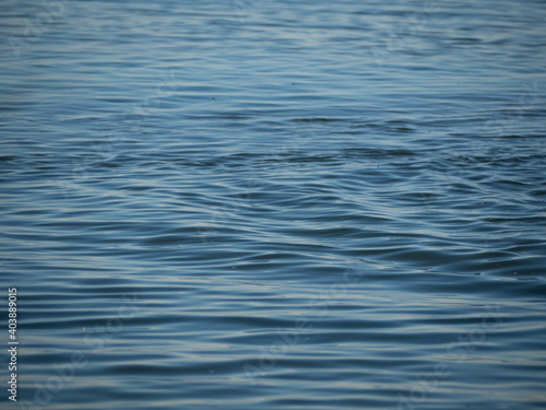 Sea water surface with small waves, like a satin blanket.