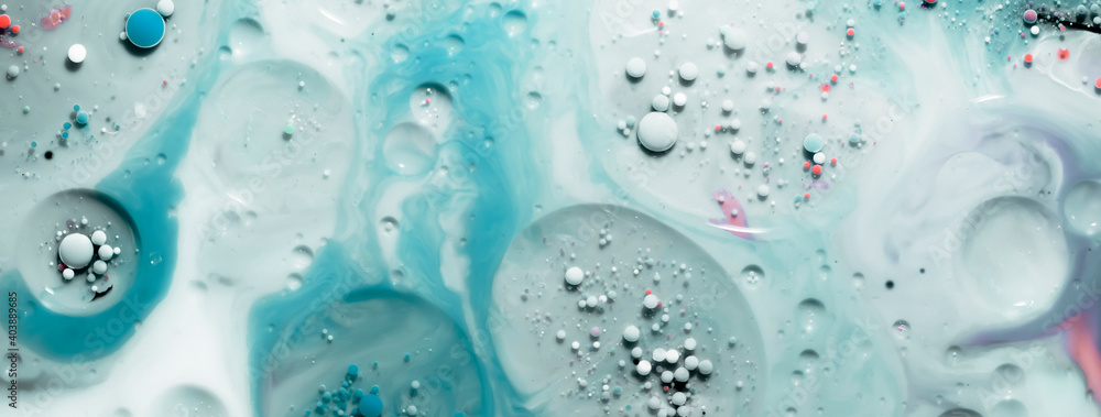 beautiful background of paint bubbles floating on water with mix of oil blue beautiful background of paint bubbles floating on water with mix of oil blue