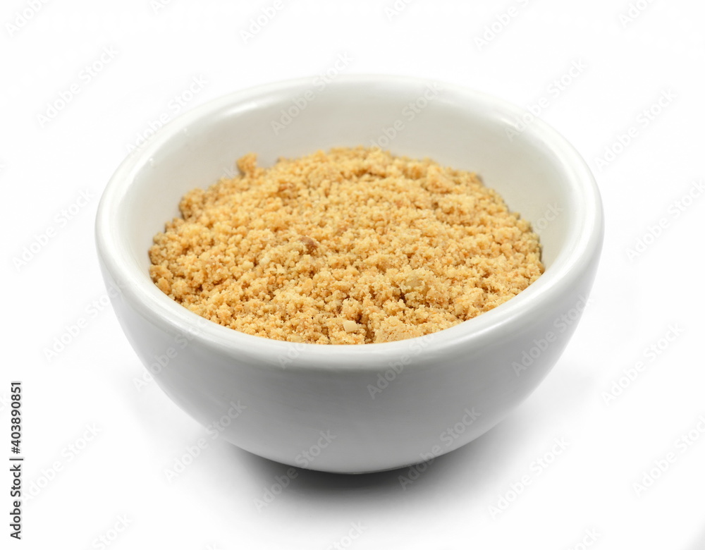 Peanut Butter Powder in a Bowl on a White Background. Ground peanuts. Peanut Butter Powder in a Bowl on a White Background. Ground peanuts.