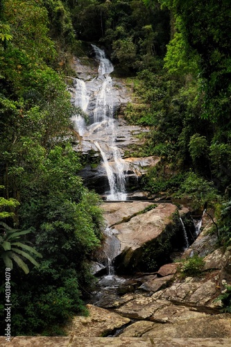 Waterfall with vegetation around in the Tijuca Forest, in Rio de Janeiro