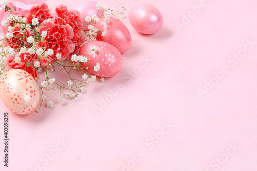 Happy Easter concept, spring greeting card, background. Decorated pink Easter eggs on a gentle background. Minimal holiday concept, place for text, banner for screen