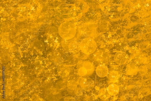 Gold metallic background, vintage foil texture, bright festive bokeh backdrop