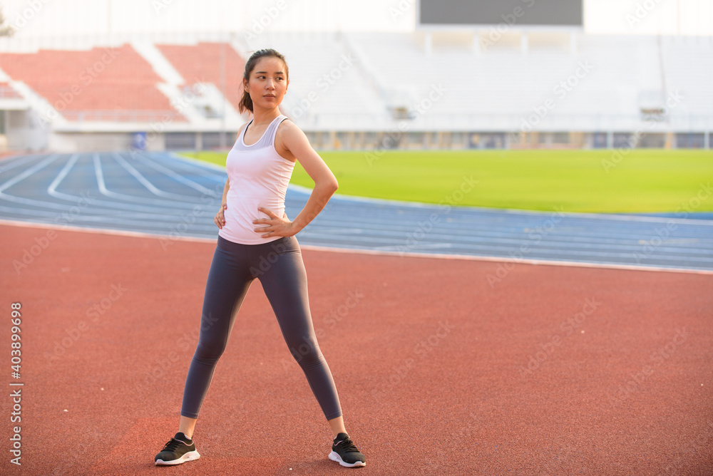 Young woman do stretch before sport