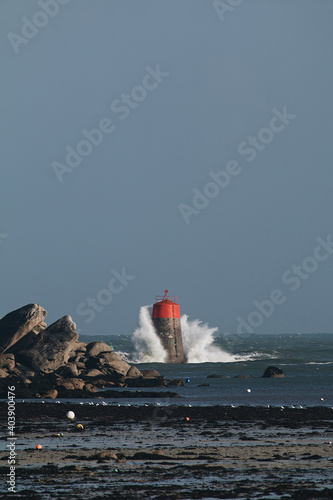 Vertical shot of shore near sea photo