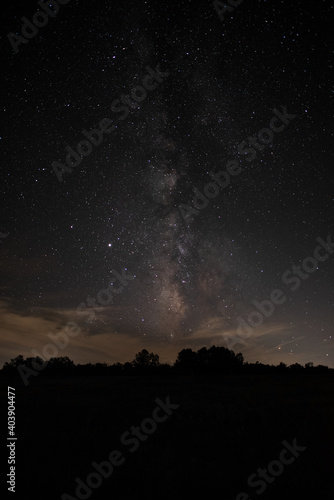 Night sky showing stars, constellations and the Milky Way. Plenty of copy space room for your message. © Andrew