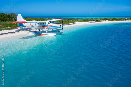 Fotografija Sea Plane Floats on Bright Blue Water