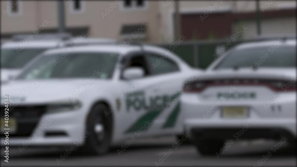 Police Car Leaves Precinct Blurry 4K Police Car Leaves Precinct Blurry 4K