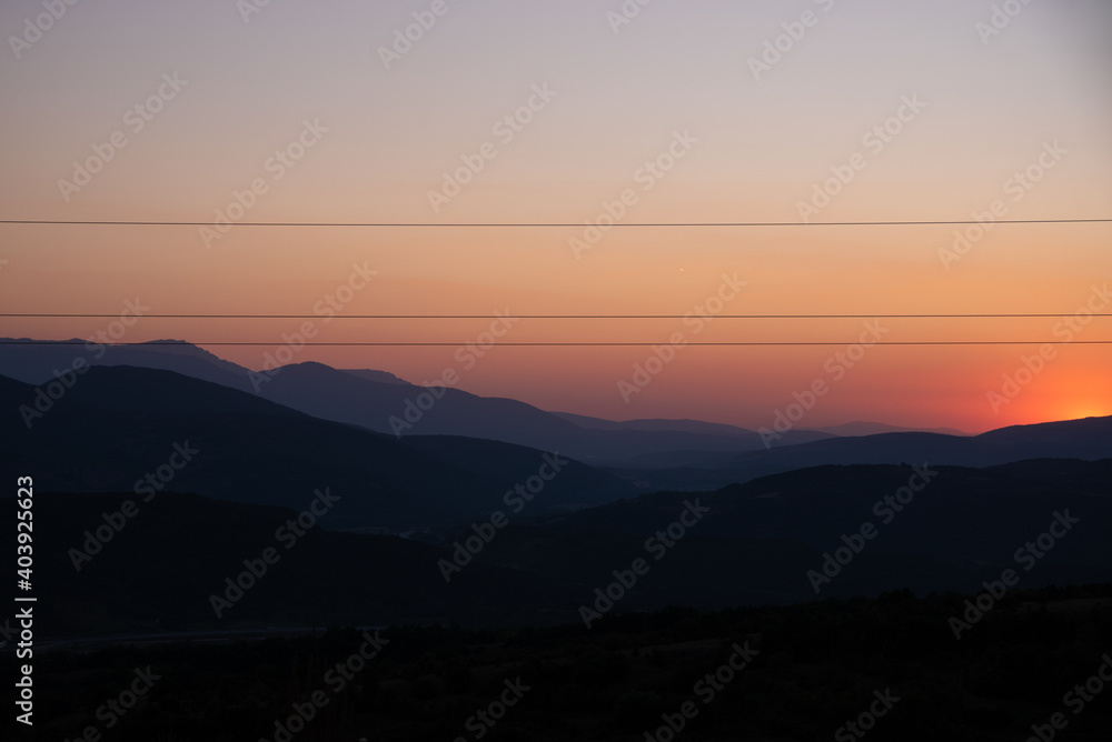 Impressive and scenic view of colorful and dramatic sunset, from a high peak of Old mountain, a view to surrounding peaks and highlands as midzor and other peaks at summer evening.
Old Mountain,Serbia