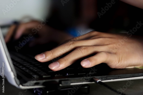 Hands typing on a keyboard. Hand typing keyboard.
