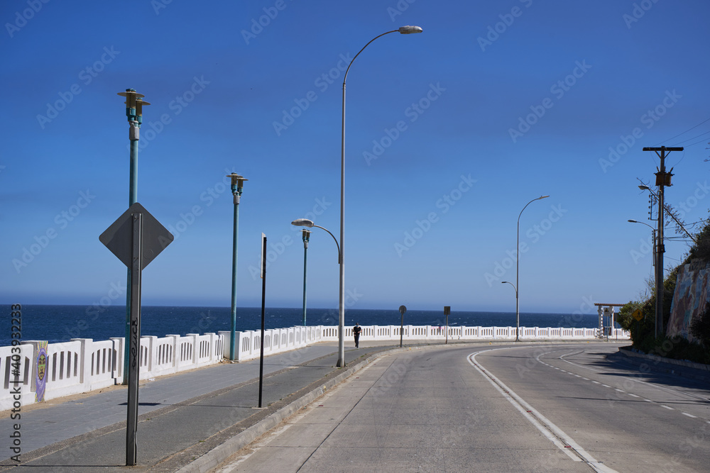 Fototapeta premium General shoot, sportswoman jogging on the waterfront. Sport in new normality