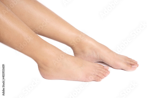 close up foots of a woman Isolated white background © Thachakrit