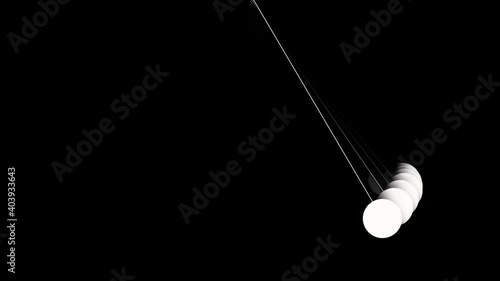 Freely swinging pendulums with motion, Mesmerizing Newtons Cradle, with its suspended metallic spheres, swings rhythmically against a stark black background.