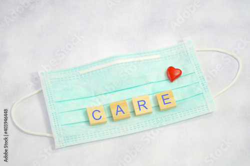 Green surgical face mask with wood block word 