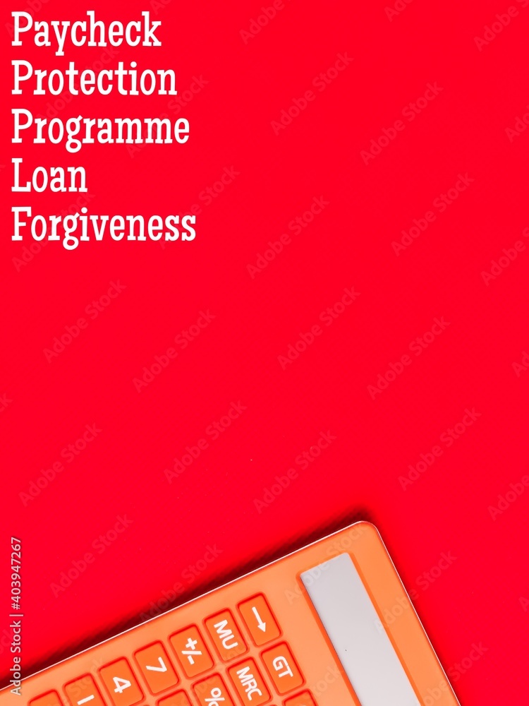 Text PPP LOAN FORGIVENESS on red background with copy space and orange calculator.Business concept. Text PPP LOAN FORGIVENESS on red background with copy space and orange calculator.Business concept.
